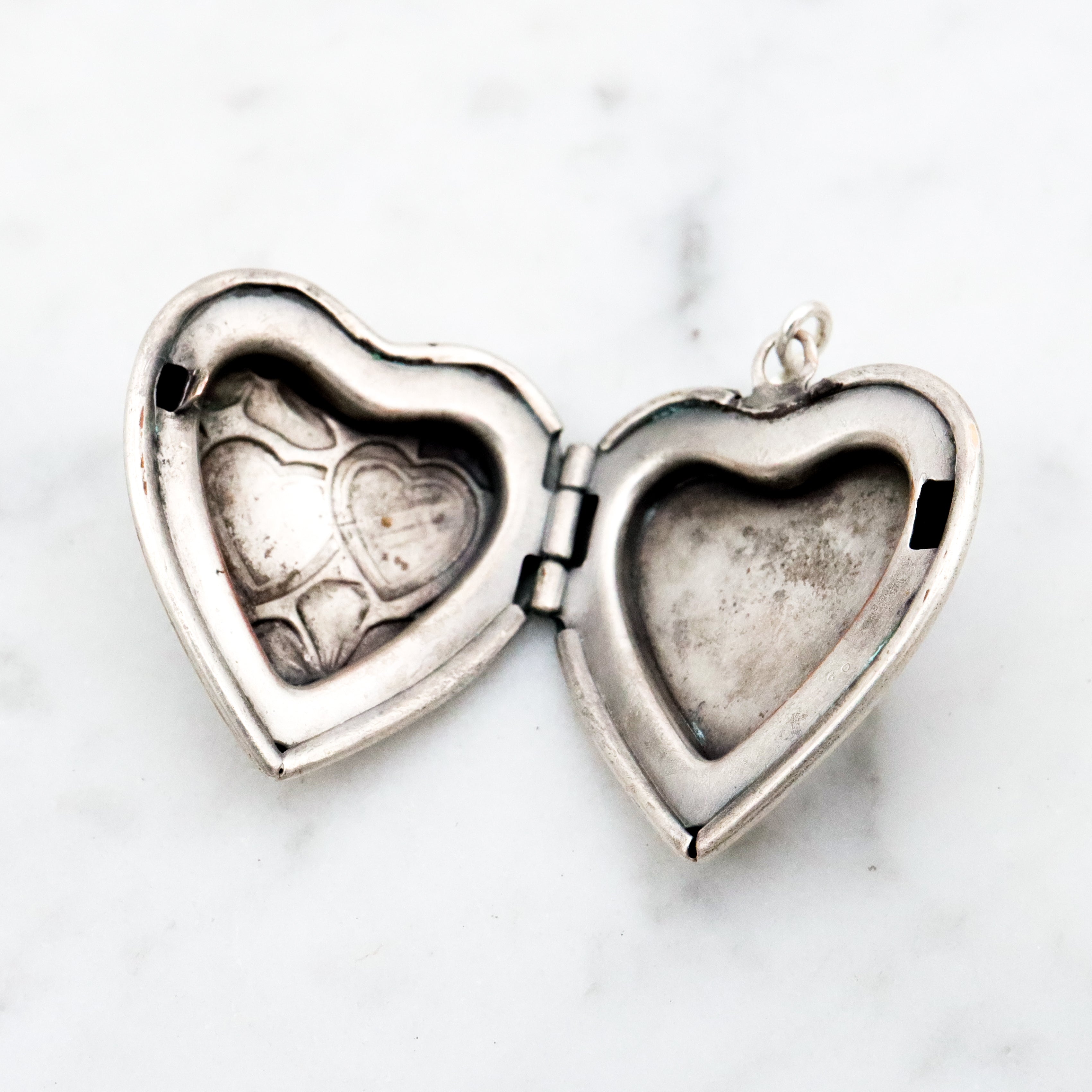 Antique sterling sweetheart locket pendant
